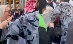 Kabe Örtüsünü Kesmeye Çalışan Kadına Müdahale