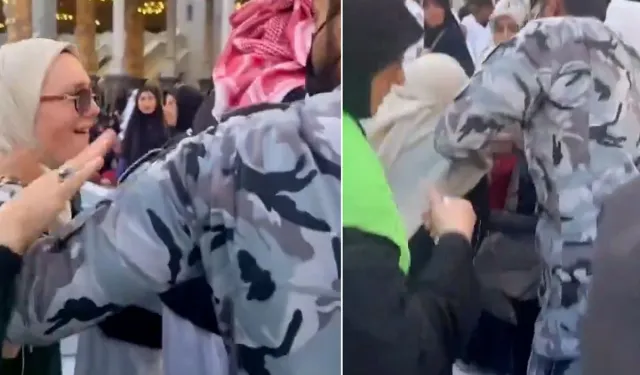 Kabe Örtüsünü Kesmeye Çalışan Kadına Müdahale